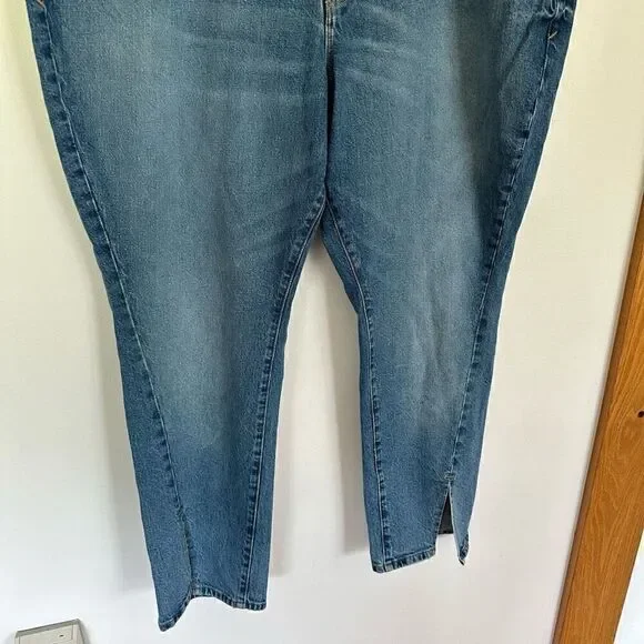 Good American Good Boy Twisted Slit Hem High Rise Indigo Jean - Picture 5 of 8